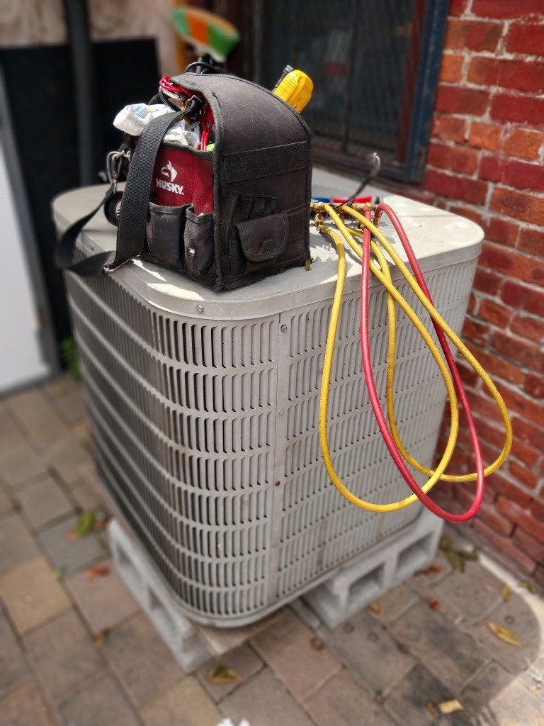 永力冷暖公司–修换热水炉，中央空调维修安装，热水炉修理更换